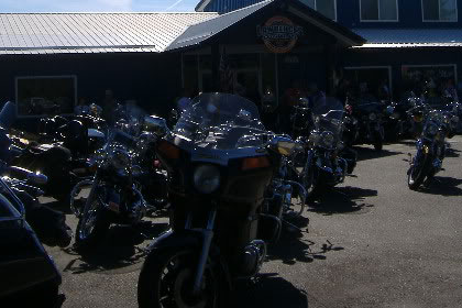 Motorcycles lined up outside of Lawrence's.