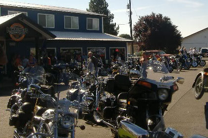 Motorcycles lined up outside of Lawrence's.