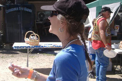 Woman outside of food tent.