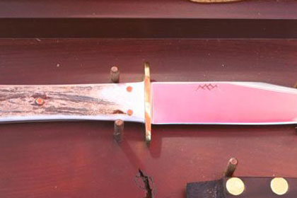 Knife and knife sheath in wooden Ride for Life 10th Anniversary box.