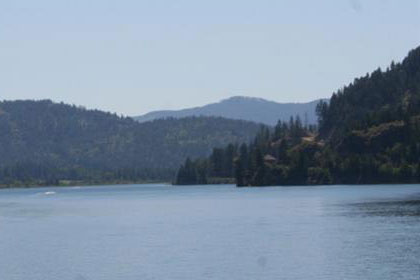 Lake with  mountains in the background.