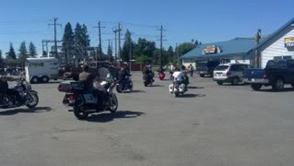 Riders on their motorcycles.