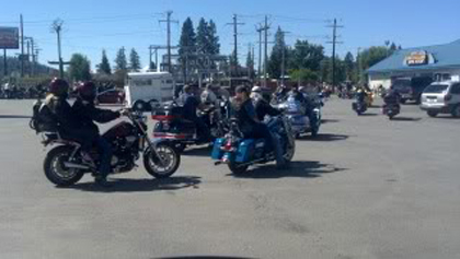 Lots of riders on their motorcycles.