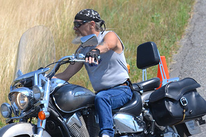 Bearded man on his motorcycle.