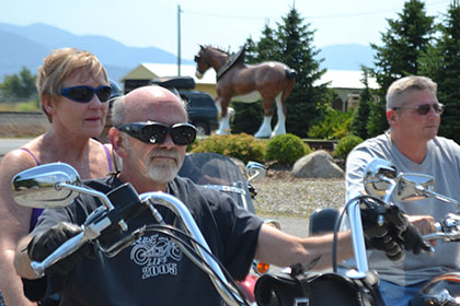 Riders on their motorcycles.