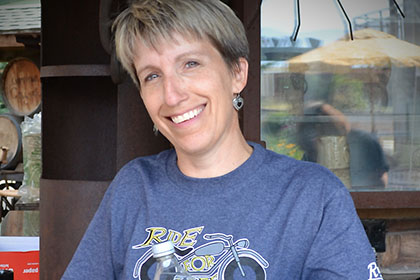 Ride for Life committee member smiles for the camera.