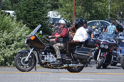 Riders leaving the parking lot.