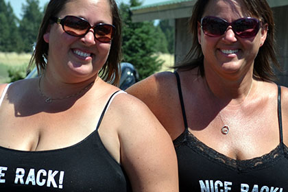 Two women smile for the camera.