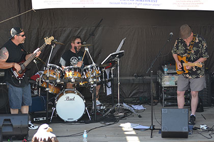 Live band playing on stage.
