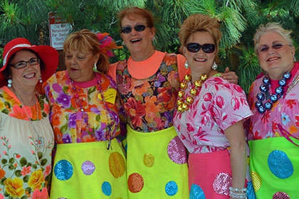 Bright dresses and smiling faces.