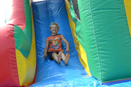 Child going down the slide.