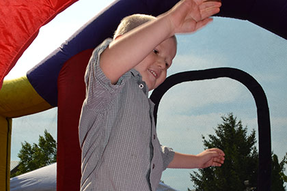 Playing in the bouncy castle.