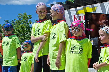 Group of children on stage at the event.