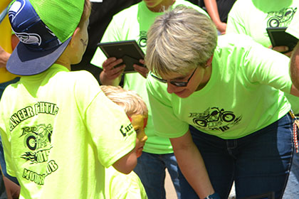 Couple children along with some Ride for Life committee members.