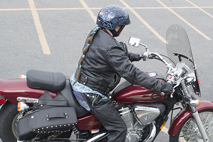 Rider on a red motorcycle.