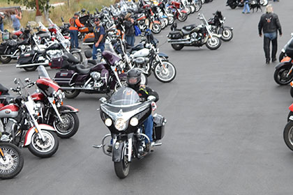 Rows of motorcycles.