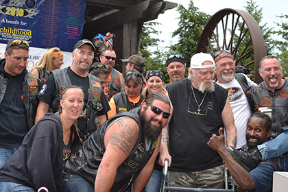 Group photo in front of Ride for Life banner.