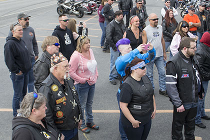 Riders gathering in the parking lot.