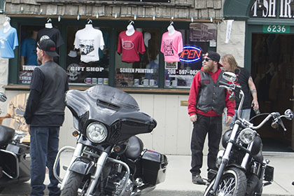 A line of parked motorcycles.