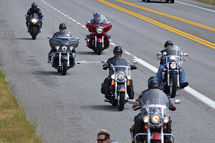 Group of seven riders on their motorcycles.
